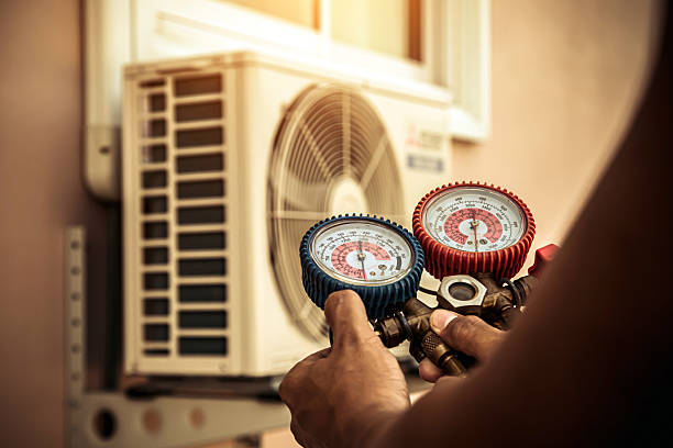 Professional Air Conditioning Service technician working in North Collins, NY